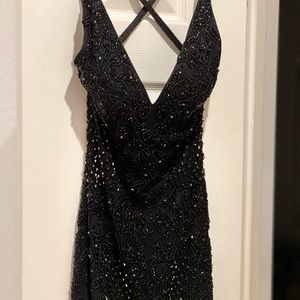 Black prom dress size 2, can be bustled in the back